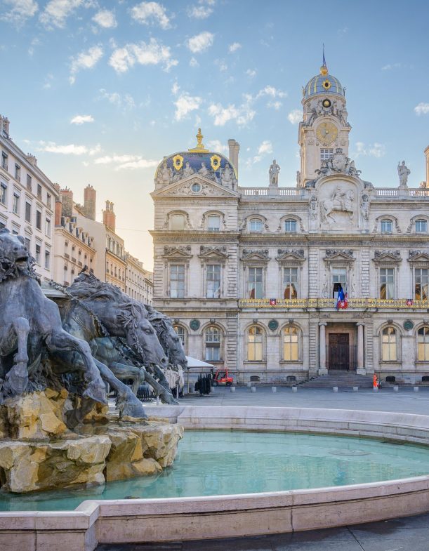 View of the fountain Bartholdi in Lyon France View of the fountain Bartholdi with the City Hall of Lyon in the Background, France